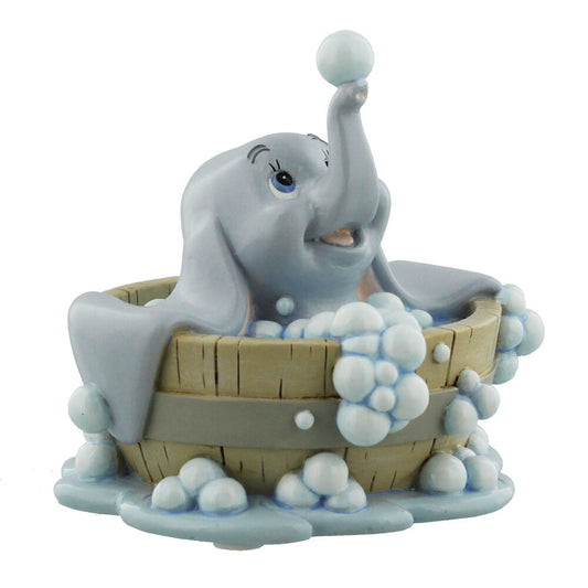 Figura de Dumbo Disney de resina en una bañera con espuma