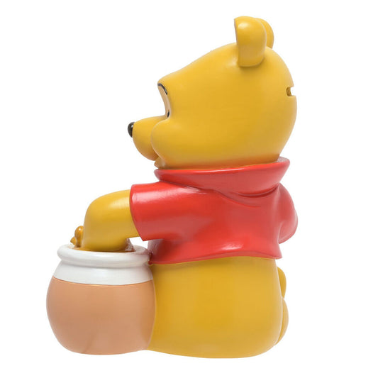 Hucha de resina de Winnie the Pooh junto a un tarro de miel - 4
