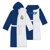 Bata Real Madrid azul y blanca con capucha, cinturón y escudo