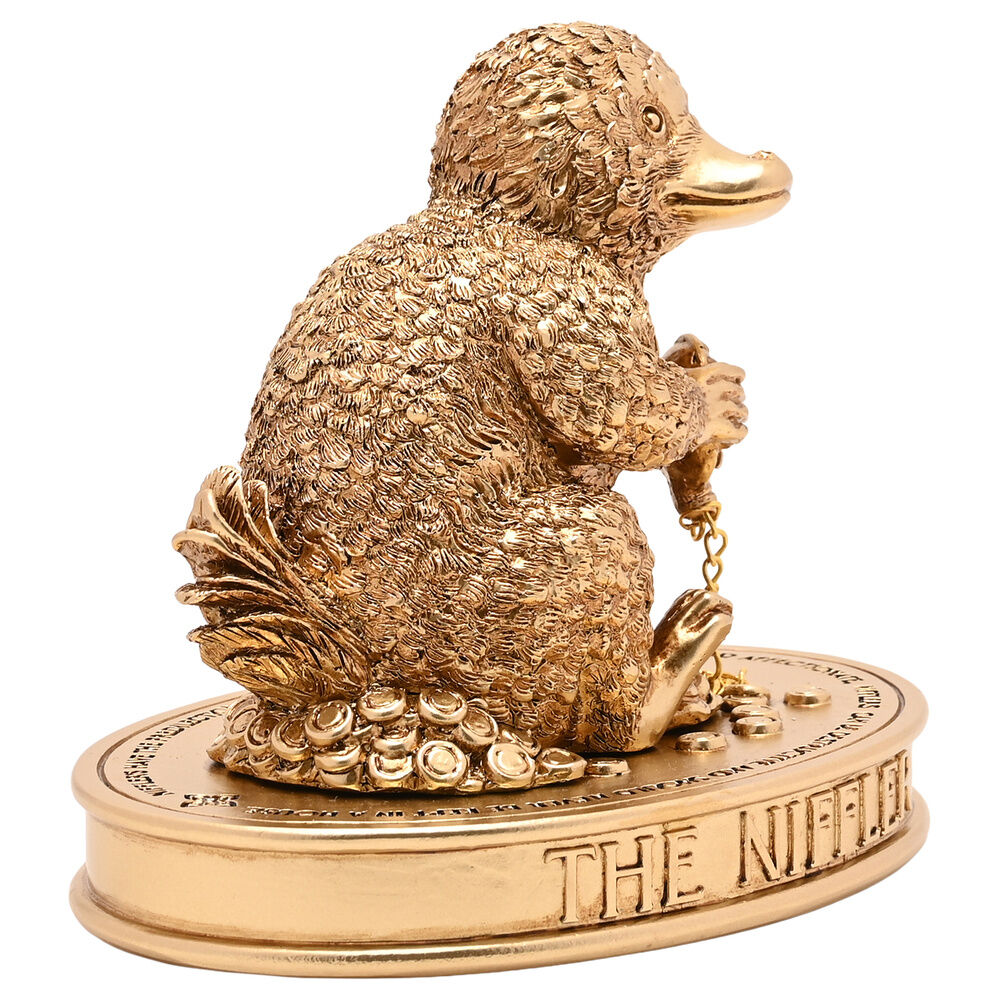Figura dorada del Niffler de Harry Potter sobre base ovalada - 2
