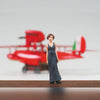 Maqueta del hidroavión rojo Savoia S.21F con figura de Gina
