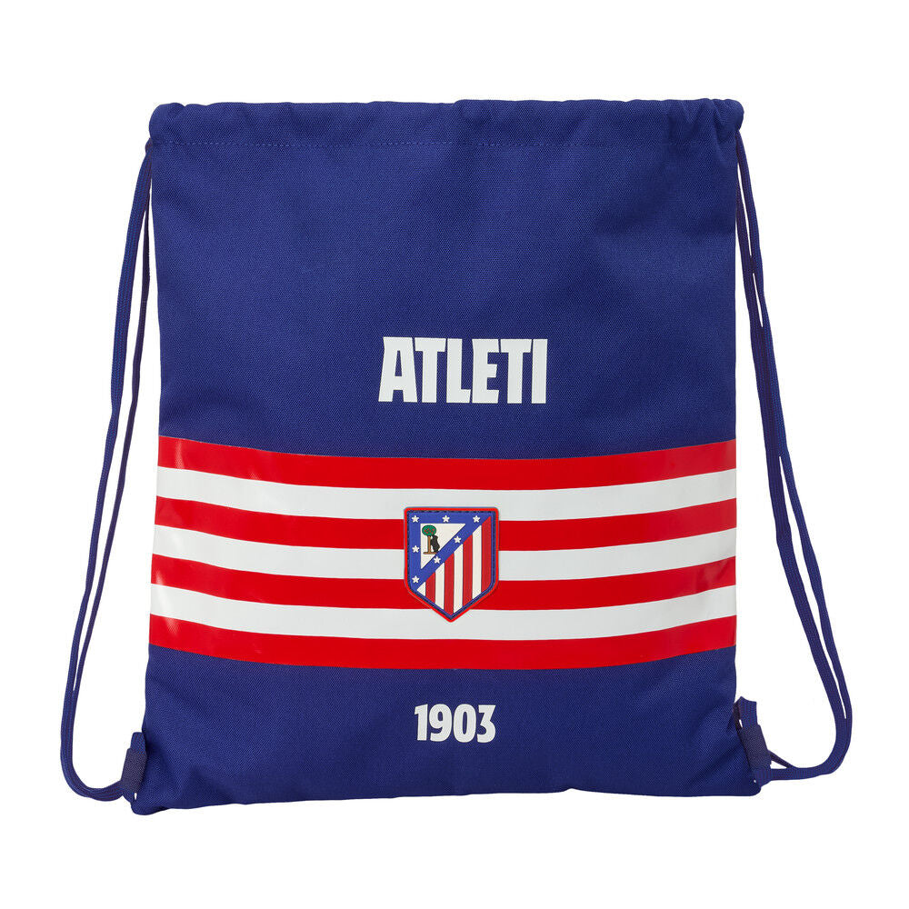 Saco azul del Atlético de Madrid con franjas rojas y blancas