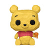 Figura Funko POP! de Winnie the Pooh sentado con camiseta rosa