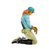Figura Ichibansho de Diego Brando arrodillado con gorra turquesa