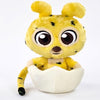 Peluche amarillo de Marsupilami asomando de un huevo blanco