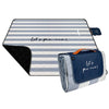 Manta de picnic PERLETTI a rayas gris y blanco plegada