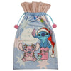 Saco de Navidad Stitch Disney azul con estrellas, regalos y pompones rosas