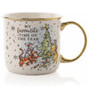 Taza blanca de Winnie the Pooh Disney con diseño navideño y detalles dorados