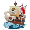 Barco Going Merry de One Piece con velas y base de olas